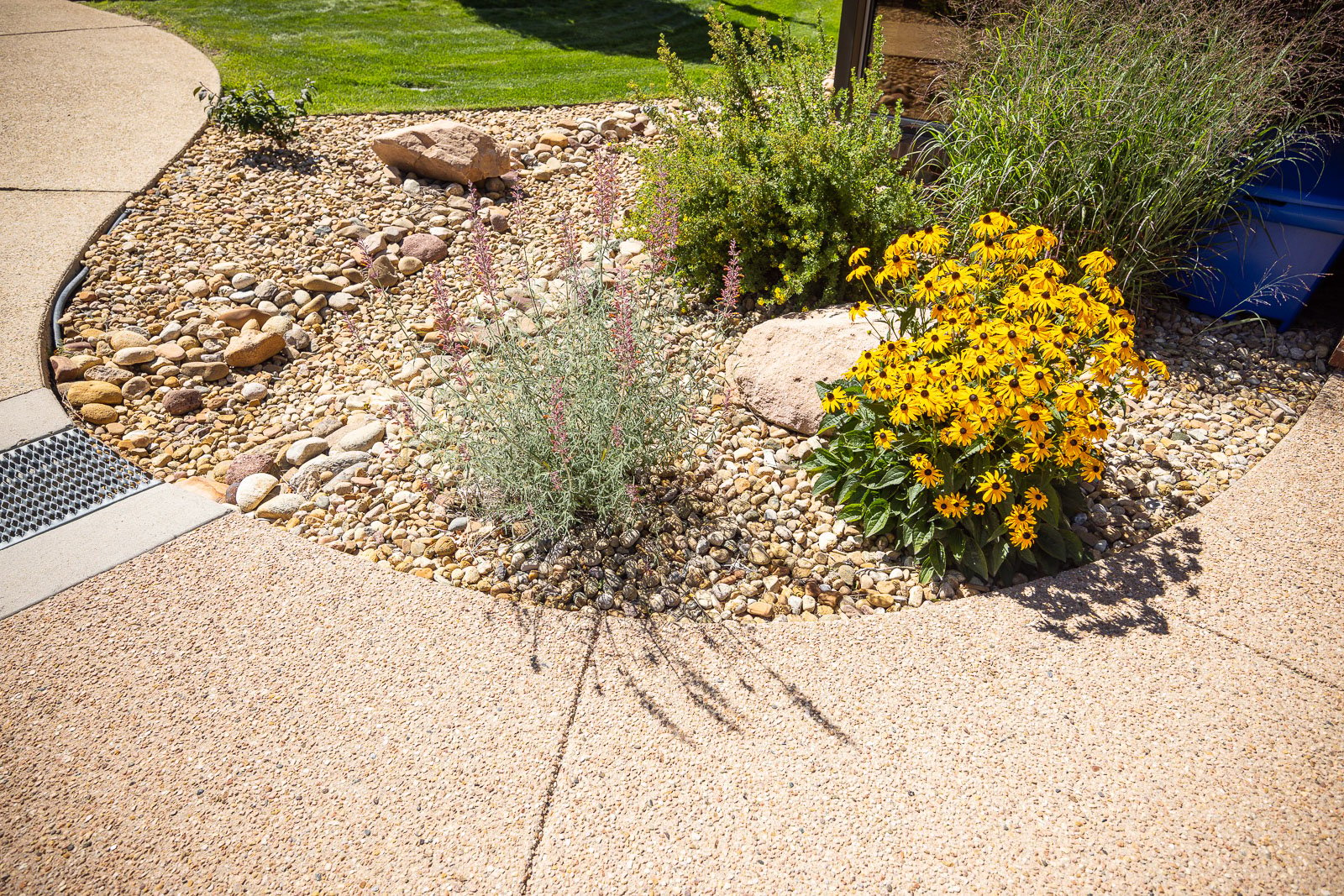 Commercial property maintenance rock flower bed 2