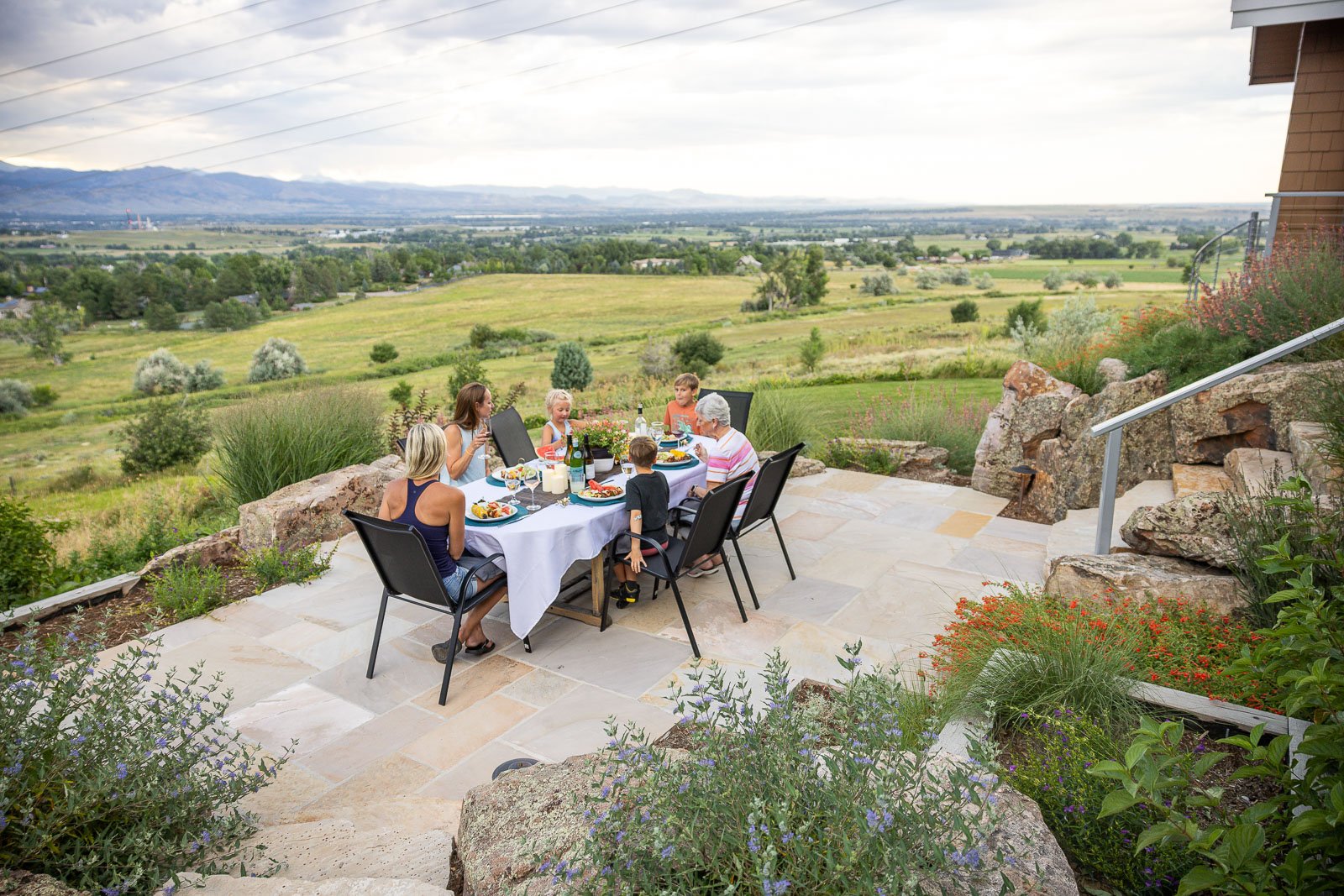 Residential landscape design clients eating on patio 3