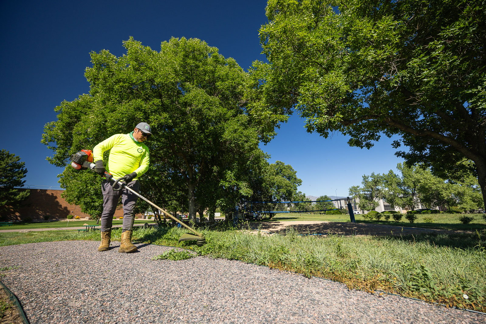 commercial maintenance  crew lawn trimming