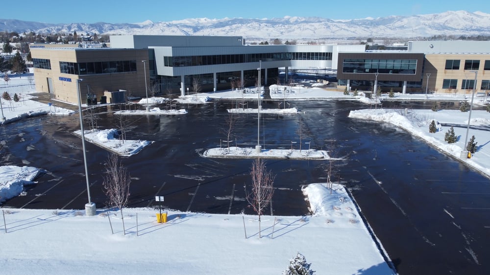 cleared parking lot from snow commercial building 