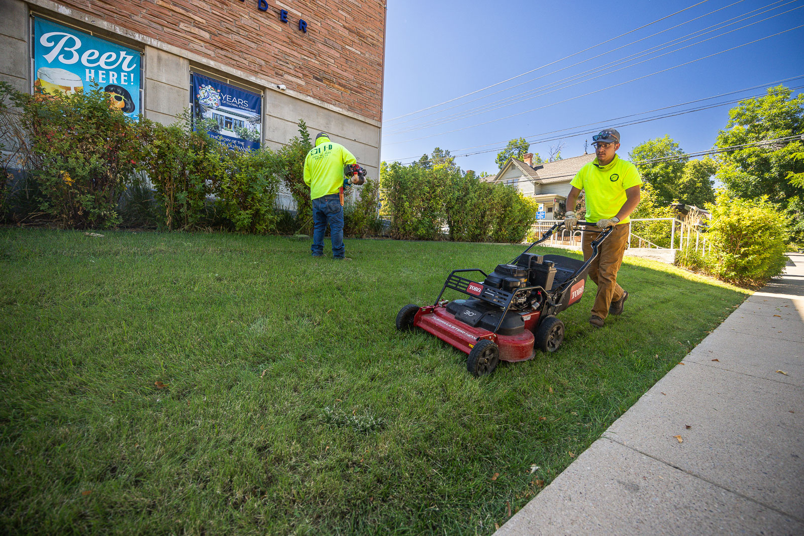 crew mowing lawn 