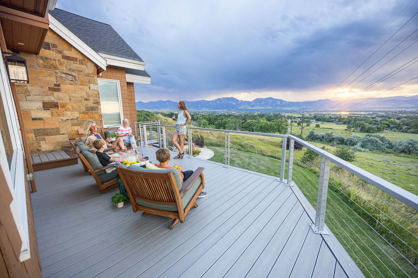 Residential landscape design clients on deck view 